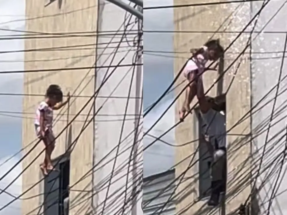PM resgata criança pendurada em fios após queda de janela